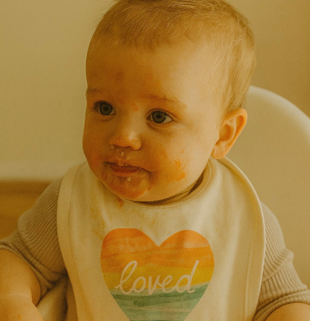Finn + Emma graphic bib | loved rainbow heart